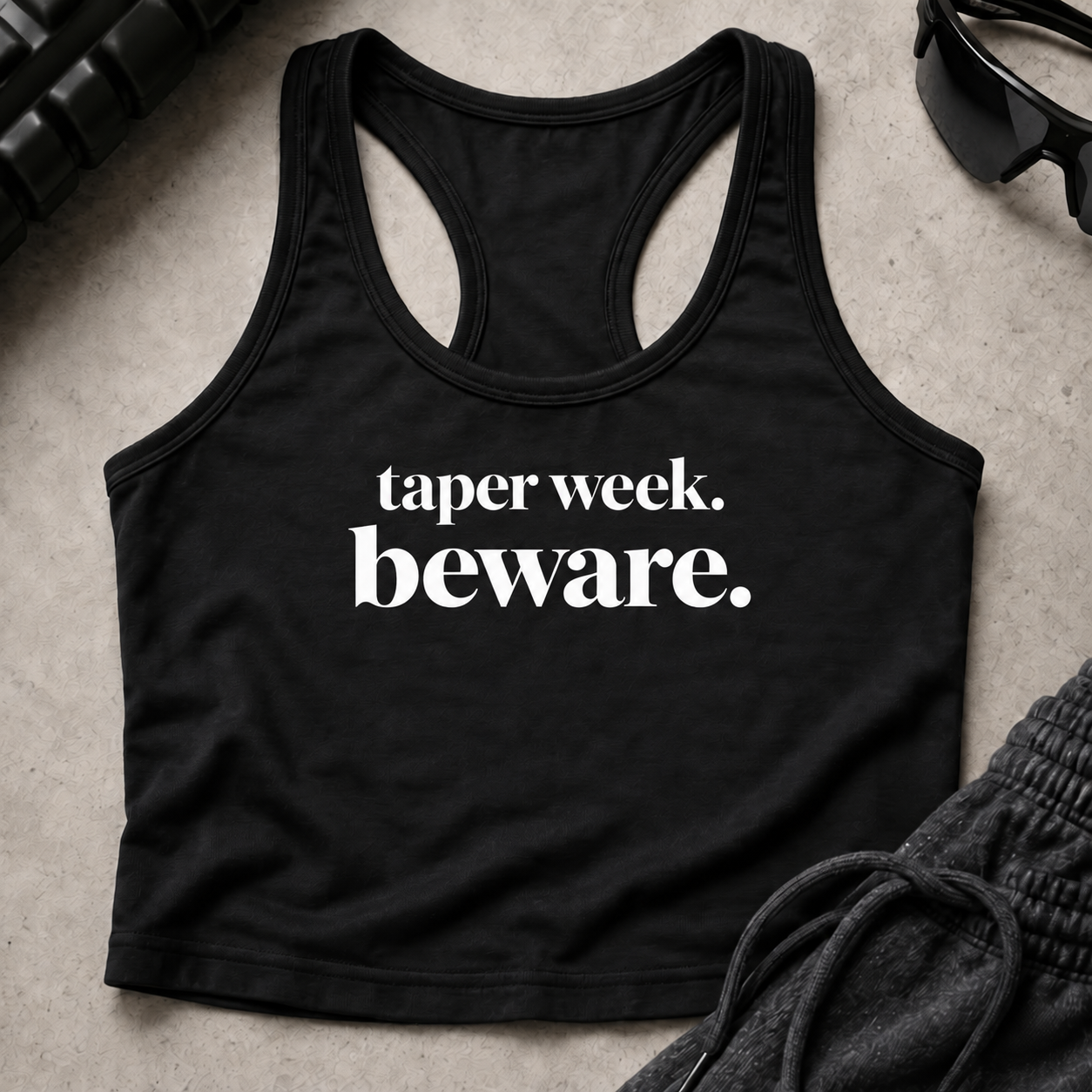 taper week beware. Racerback Crop Tank