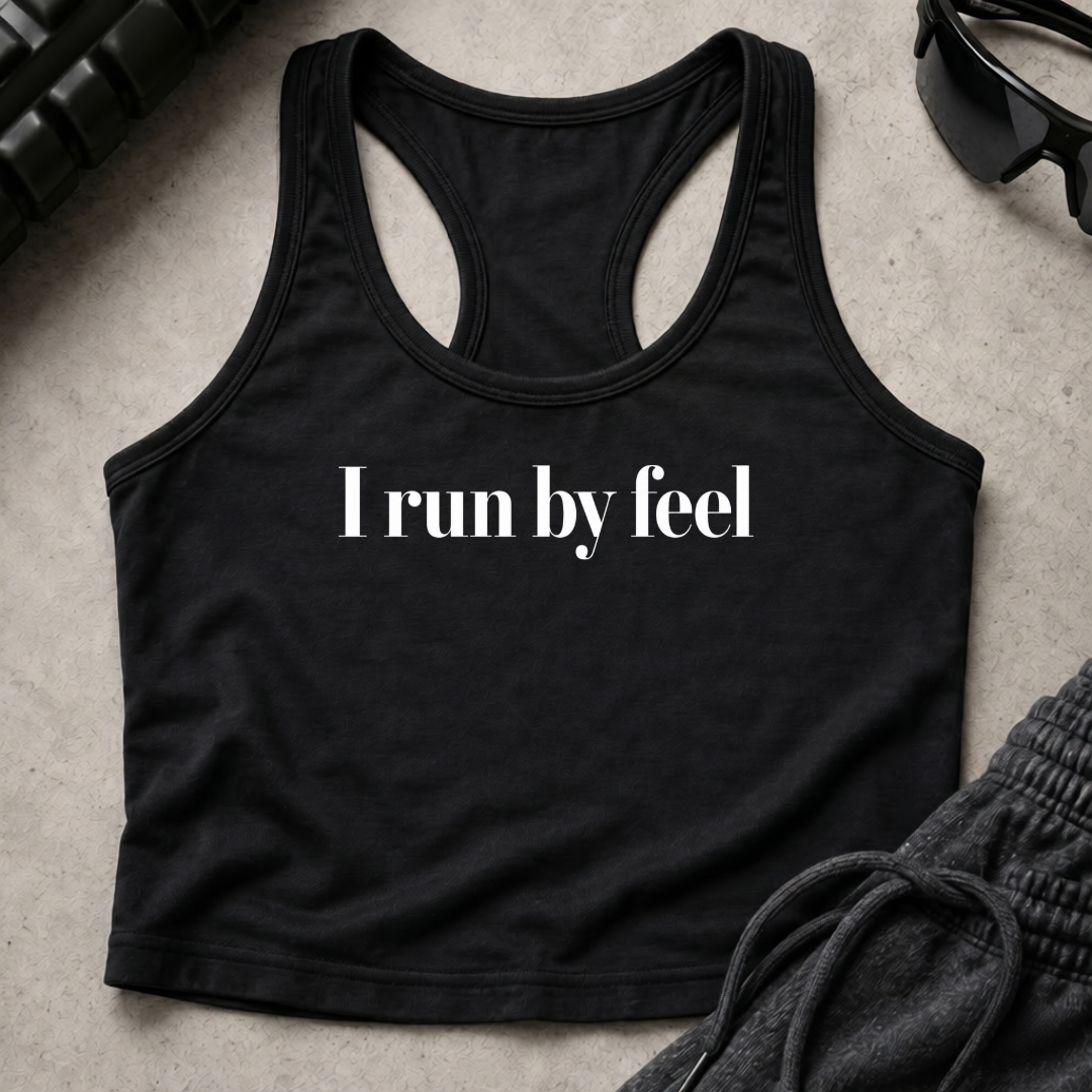 i run by feel. Racerback Crop Tank