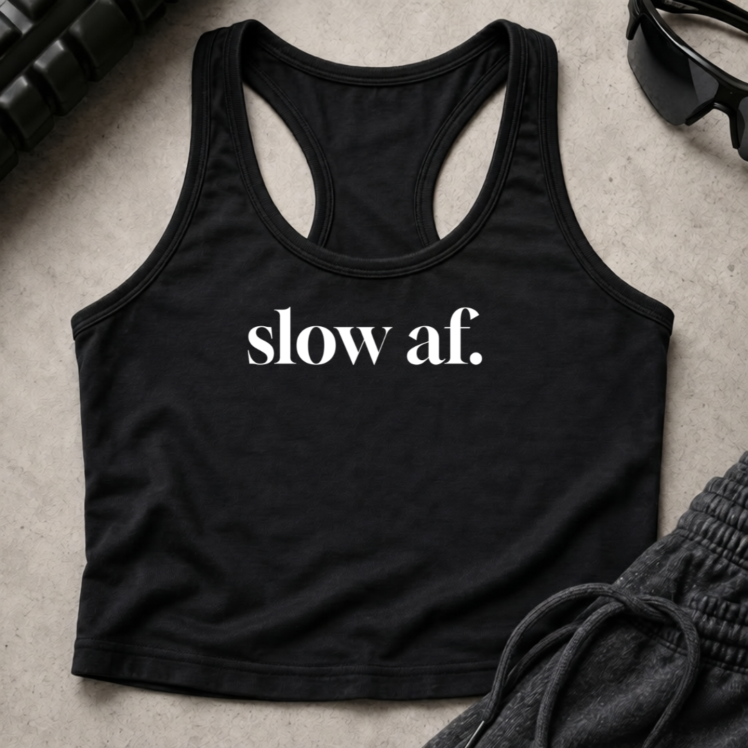 slow af. Racerback Crop Tank